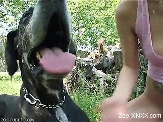 Tatted-up blonde banging a black dog on camera