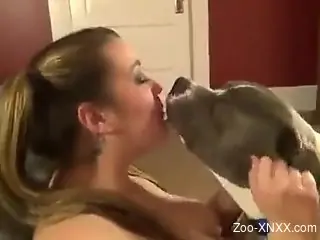 Pigtailed chick making out with a sexy animal