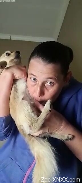 Mature shows off sucking her small dog's tiny dick